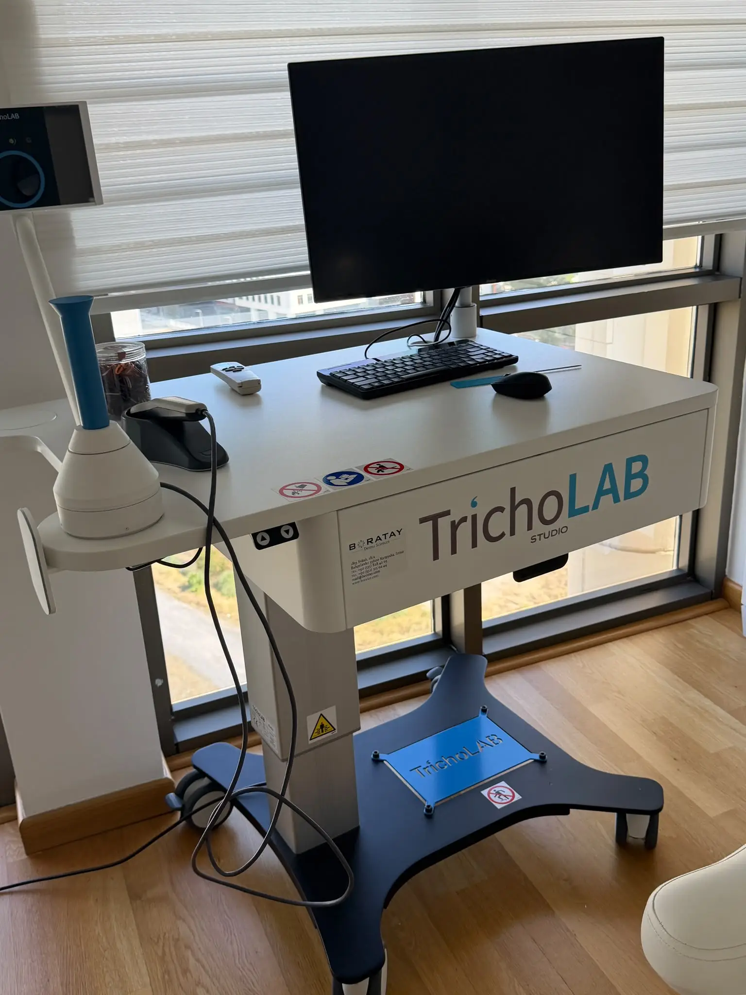 Advanced Tricholab hair and scalp analysis equipment at our hair transplant clinic in Tehran, Iran.