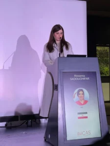 Dr. Roxanna Sadoughifar presenting on stage at the IMCAS World Congress 2026 in Paris.